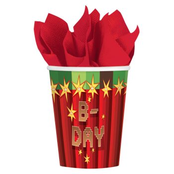 Birthday-themed cup with red napkins.