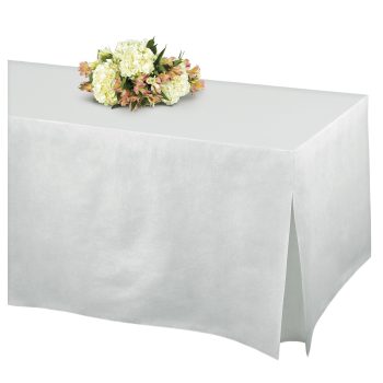 White tablecloth with floral centerpiece.