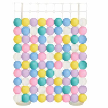 Colorful balloon wall decoration with geometric pattern.