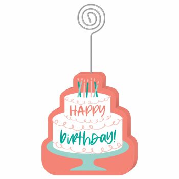 Birthday cake decoration with candles and holder.