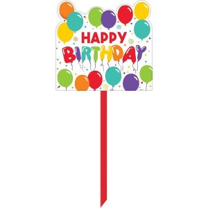 Happy Birthday sign with colorful balloons.