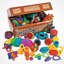 Box of assorted colorful sensory toys.