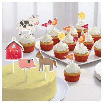 Farm-themed cupcakes with animal toppers.