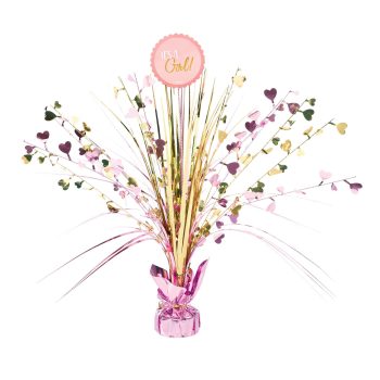 Decorative pink centerpiece with heart-shaped accents and floral elements.