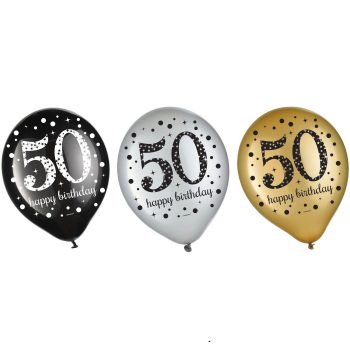 Three 50th birthday balloons with polka dots.