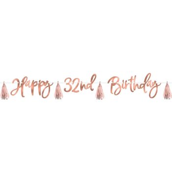 A rose gold "Happy 32nd Birthday" banner with decorative tassels.