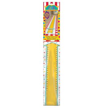 Yellow plastic ruler with centimeters and inches, in packaging.