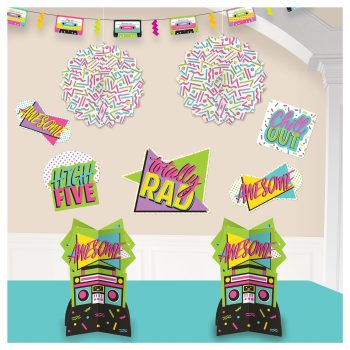 Decorative party setup with colorful confetti balls and retro-themed signs.