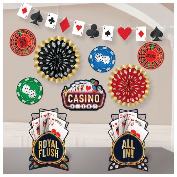 Casino-themed wall decor with cards, poker chips, and roulette wheel.