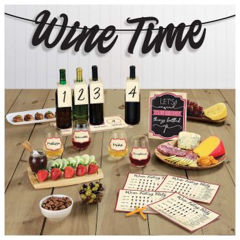 Wine tasting setup with snacks and labels.