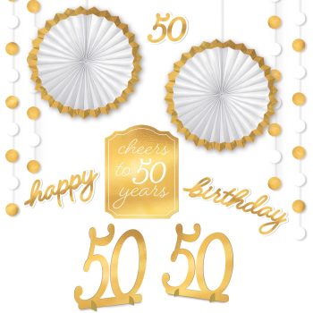 Golden 50th birthday celebration decorations and signs.