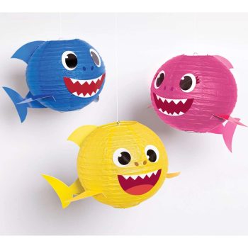 Colorful paper fish with big eyes and wide smiles.