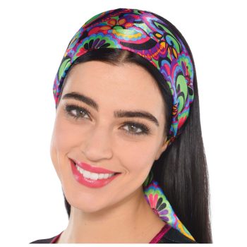 Smiling woman wearing a colorful patterned headscarf.