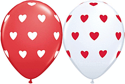 Red and white balloons with heart patterns.