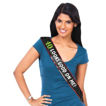 Woman with "40 Looks Good On Me" sash.