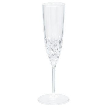 Crystal champagne flute with intricate design.