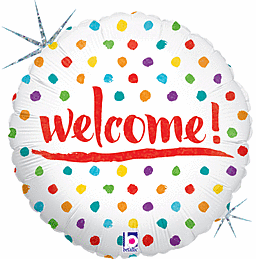 Colorful polka dot welcome balloon with red text.
