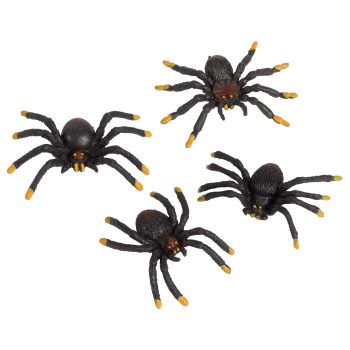 Four realistic black spider toys on white.