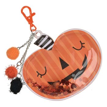 Pumpkin keychain with pom-poms and clip.