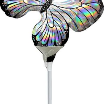 A fork holding a delicate, iridescent butterfly.
