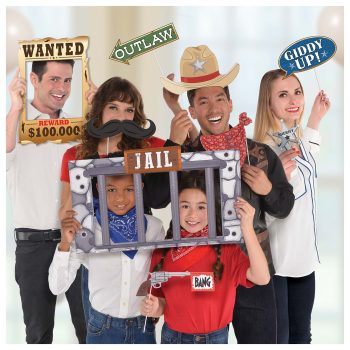Family dressed as police and criminals for a playful photo.