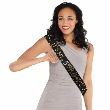 Woman wearing "It's My 51st Birthday" sash.