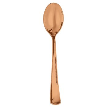 Copper-colored spoon on white background.