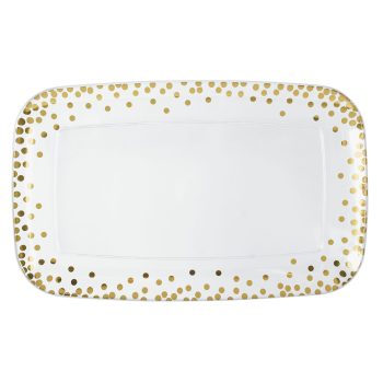 Rectangular plate with gold polka dot pattern.