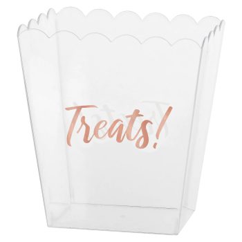 Clear treat container with scalloped edges.