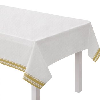 White tablecloth with gold-striped edges.