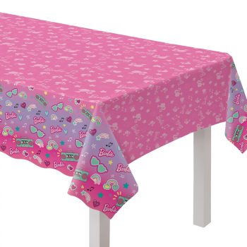 Pink tablecloth with retro Barbie designs.