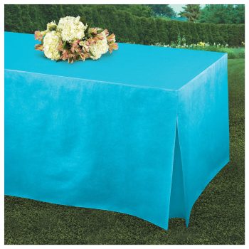 Blue tablecloth with flowers on table.