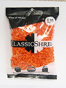 Bag of orange shredded Classic Shred cheese.