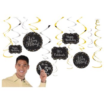 Birthday decorations with man holding number five.