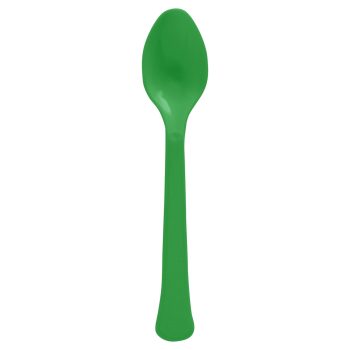 Green plastic spoon on white background.