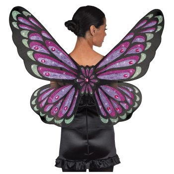 Woman wearing colorful butterfly wings costume.