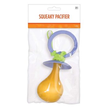 A yellow squeaky pacifier toy with a purple ring and green accents in packaging.