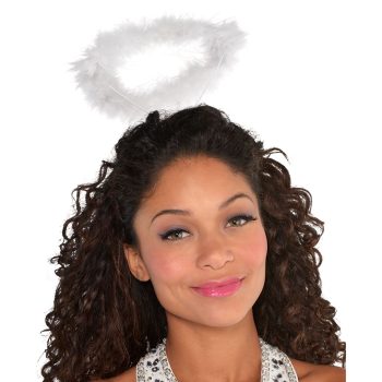 Woman wearing halo headband, smiling.