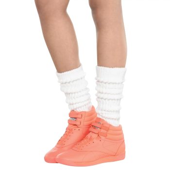 Legs wearing pink sneakers and white leg warmers.