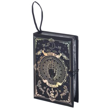 Book of spells with mystical design.