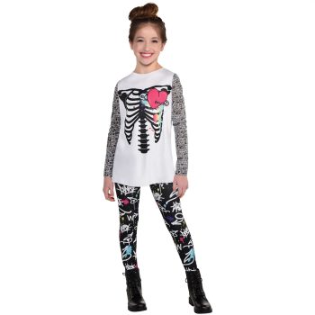 Girl wearing skeleton-themed outfit, smiling.