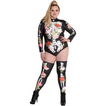 Woman in floral skeleton costume and boots.