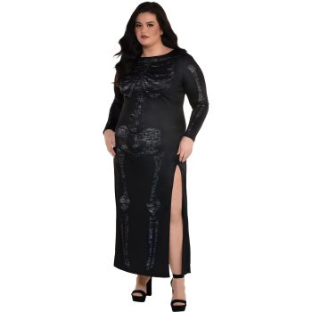 Woman in skeleton-print black dress, posing confidently.