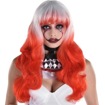 Woman in clown makeup with orange hair.