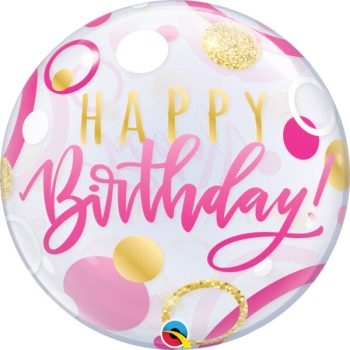 Birthday balloon with colorful circular patterns.