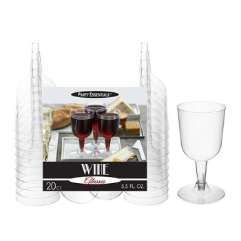 A wine-themed decorative box with a clear wine glass beside it.