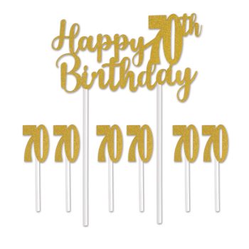 Gold "Happy 70th Birthday" cake toppers with candles.