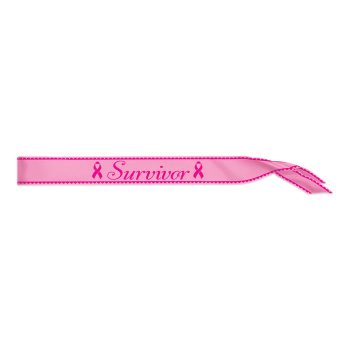 Pink ribbon bracelet with 'Survivor' text and breast cancer awareness ribbons.