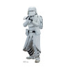 A Star Wars snowtrooper aiming a blaster rifle.