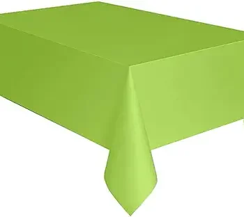 A plain green rectangular tablecloth draped over a table.
